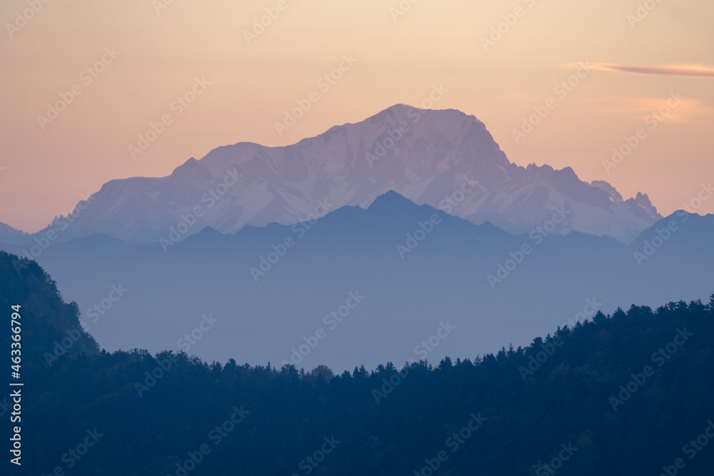 Layers of mountains at sunrise and Mont Blanc in the background