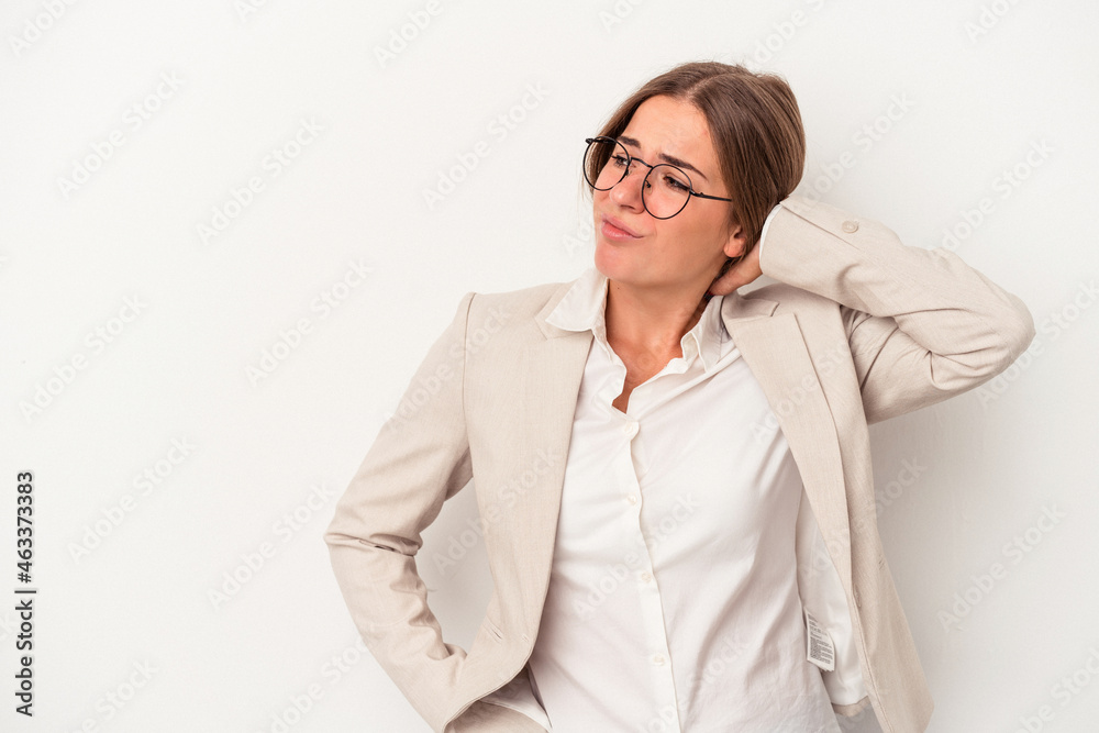 Young Russian business woman isolated on white background touching back of head, thinking and making a choice. Young Russian business woman isolated on white background touching back of head, thinking and making a choice.