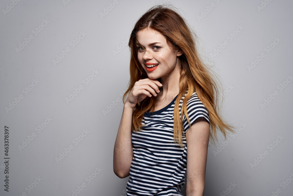 beautiful woman holding hair makeup posing fun fashion isolated background beautiful woman holding hair makeup posing fun fashion isolated background