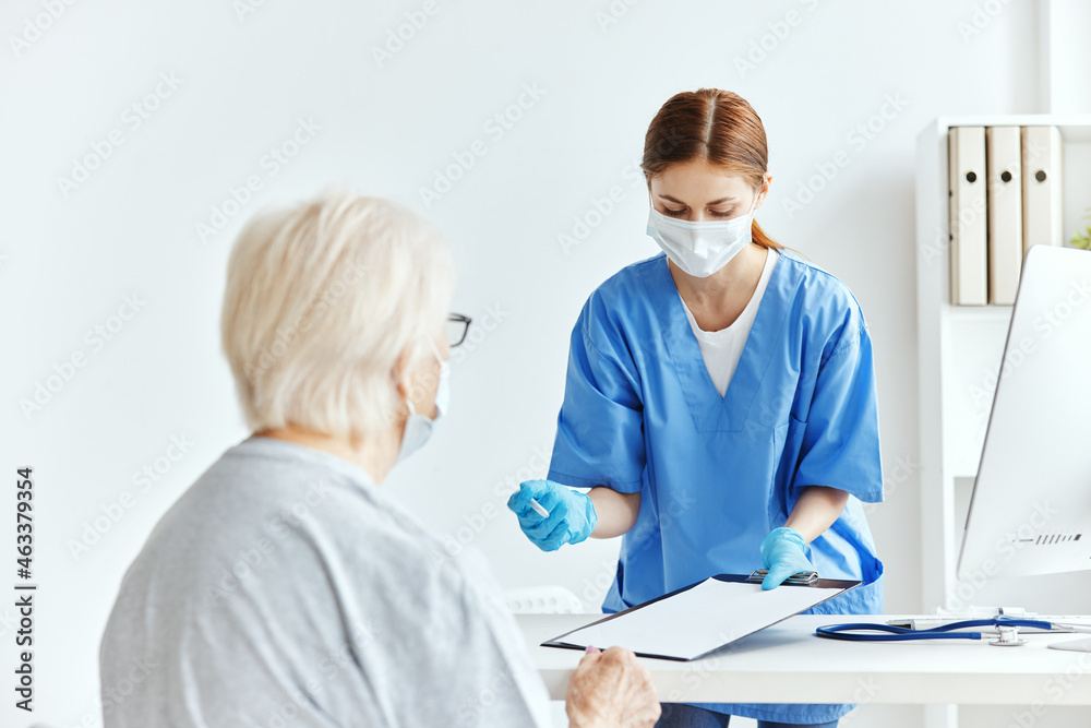 Fototapeta premium nurse and patient Hospital visit checkup