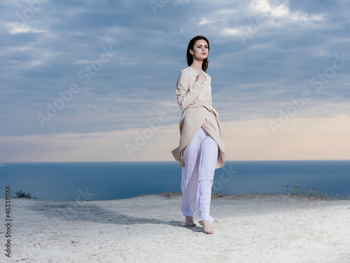 pretty woman on the beach landscape island posing fashion