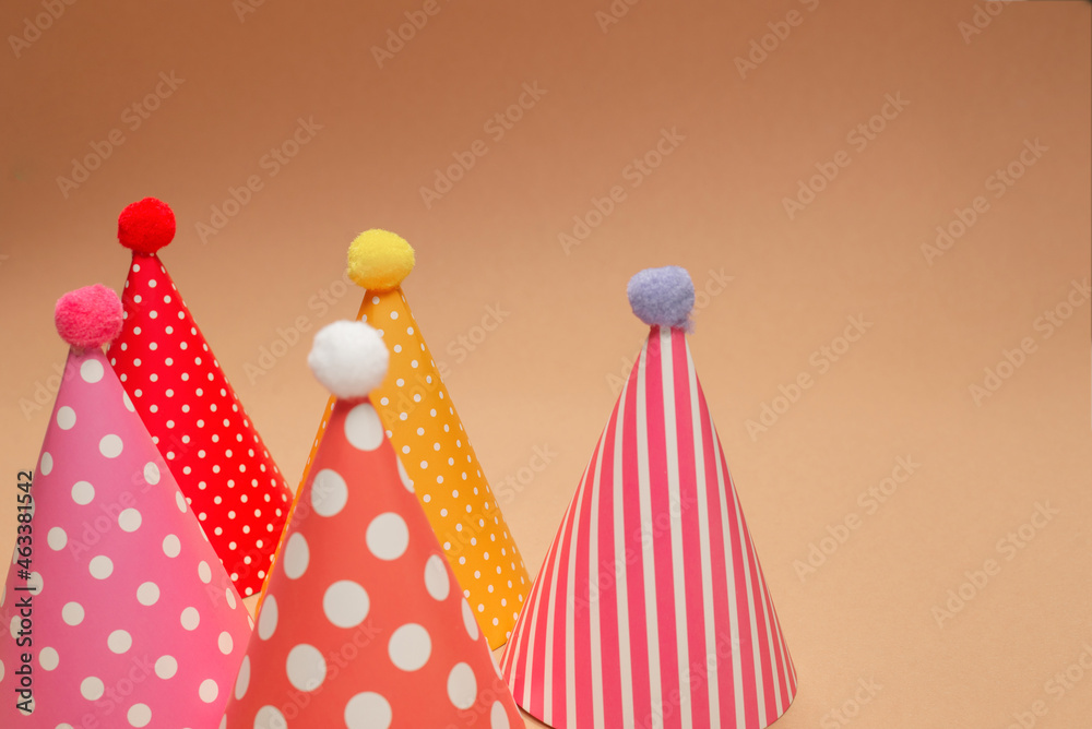 Colorful birthday cap on brown background. Colorful birthday cap on brown background.