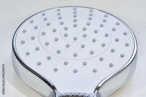 Closeup of a shower head, no water