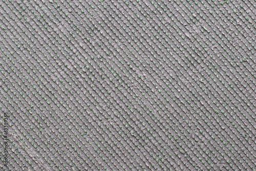 Textured rubber mat surface with seams 