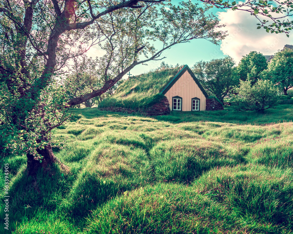 Magical charming beautiful landscape with turf roof church in old Iceland traditional style and mystical cemetery in Hof, Skaftafell, Vatnajokull National Park. Exotic countries. Amazing places.