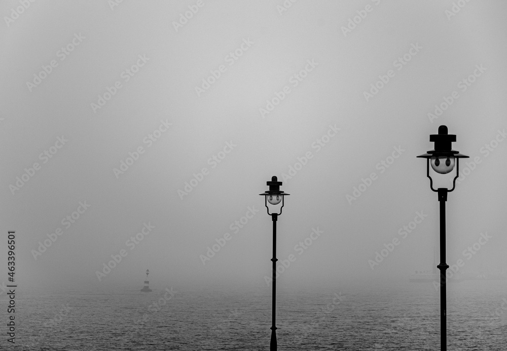 street lamp in the city sea fog