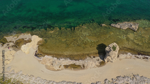 Aerial drone photo of small bay and sandy beach of Pouria with strange rock formations in island of Skyros, Sporades, Greece photo