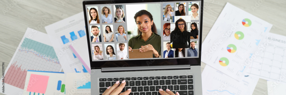 Woman sitting on floor near documents and communicating via video link with team of employees top view Woman sitting on floor near documents and communicating via video link with team of employees top view