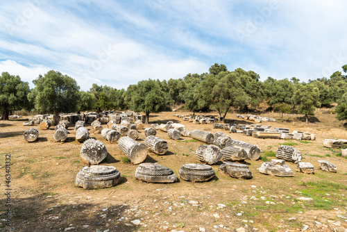 Fragments of columns on the ground at Euromos ancient site in Mugla province of Turkey. photo