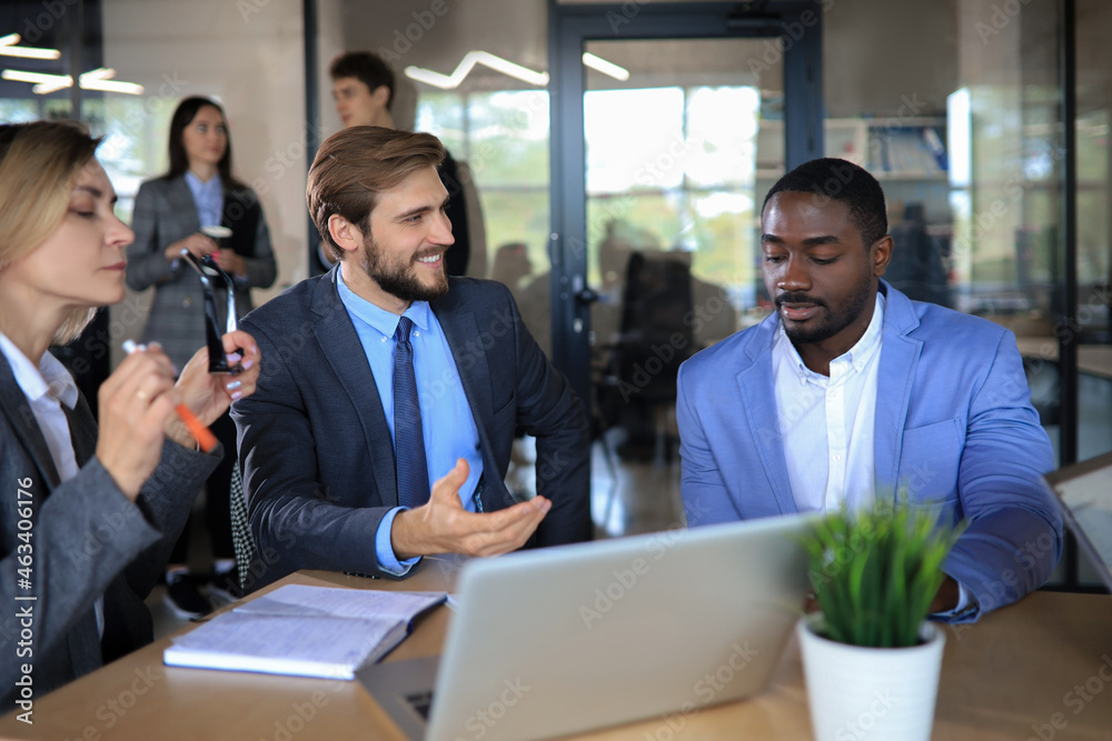 Business adviser analyzing financial figures denoting the progress in the work of the company.