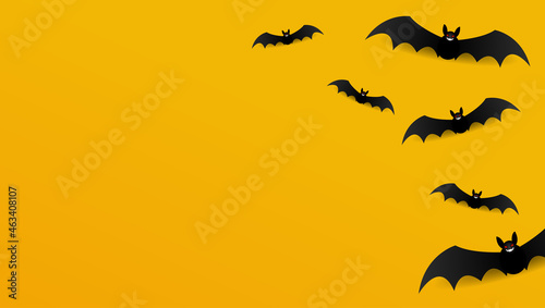 halloween background with bats on yellow