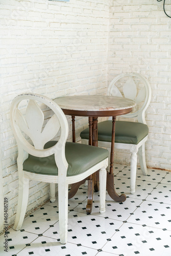 vintage table and chair with white wall