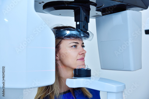 Принти на полотні Famale patient make a x-ray picture on dental a tomograph.