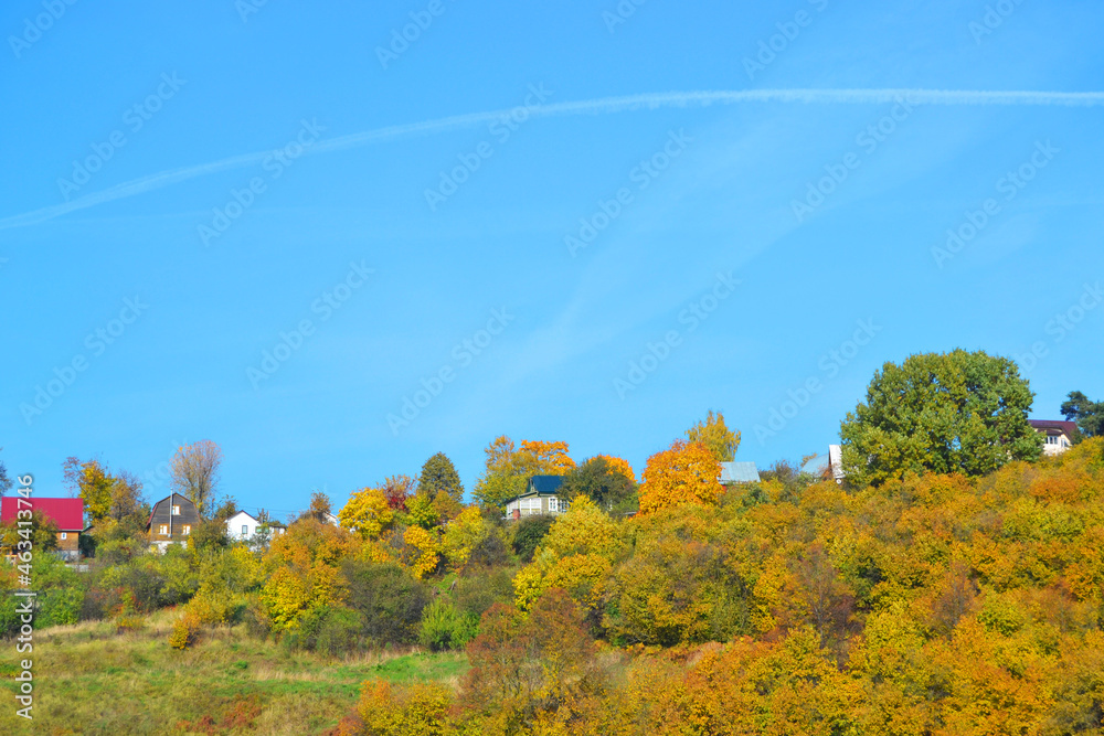 Fototapeta premium Autumn Rustic landscape under a bright blue sky