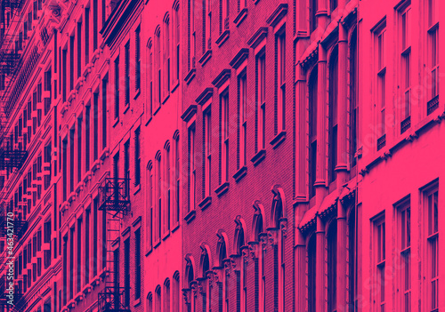 Old colorful buildings in SOHO Manhattan, New York City with pink and blue duotone colors