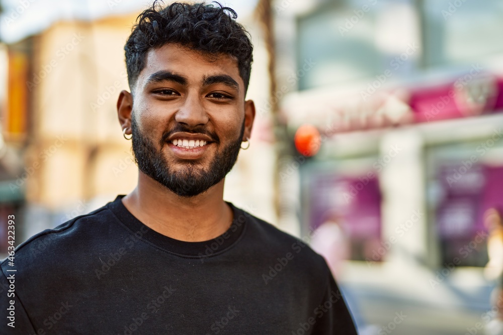 Young arab man smiling confident at street Young arab man smiling confident at street