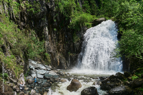 Estyube Waterfall at Lake Teletskoye in the Altai Mountains. photo