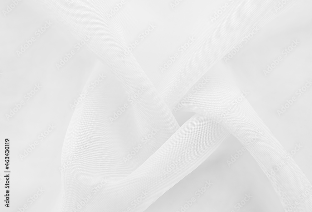White fabric. The texture of the material, chintz or satin in a light shade with folds and waves. Cloth