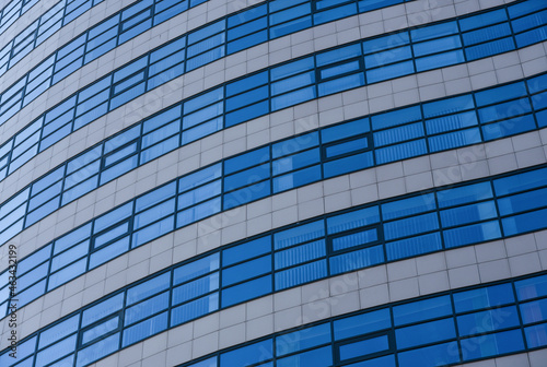 Curved windows on the wall of a modern building