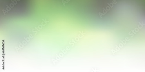 Light green, yellow vector blurred texture.