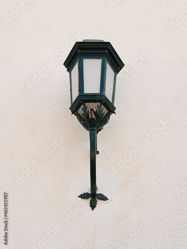 Fotografie Exterior antique lamp on stone facade