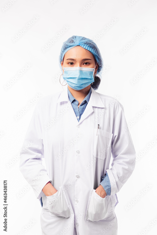 Young female doctor portrait Asian doctor in lab coat with arms crossed Standing against isolated on white background Protection against contagious disease covid 19 or coronavirus Copy space Young female doctor portrait Asian doctor in lab coat with arms crossed Standing against isolated on white background Protection against contagious disease covid 19 or coronavirus Copy space