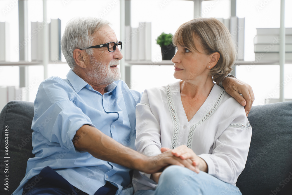 Obraz premium A simple day of a retired couple. Mature couple sitting in the living room
