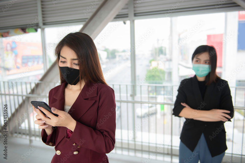 Asian woman wear face mask for protect COVID-19 virus,Thailand people,social distancing Asian woman wear face mask for protect COVID-19 virus,Thailand people,social distancing