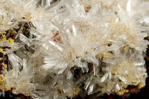 Macro mineral stone crystals Hemimorphite rock on a black background photo