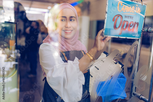 Happy business owner at their shop