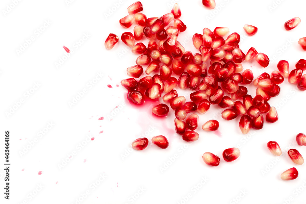 Scattered Pomegranate Seeds Isolated on White Background