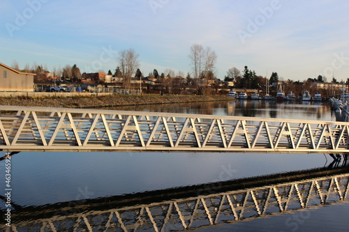 Water reflection under dock gangway photo