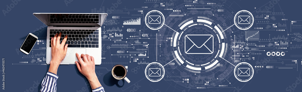 Email concept with person using a laptop computer Email concept with person using a laptop computer