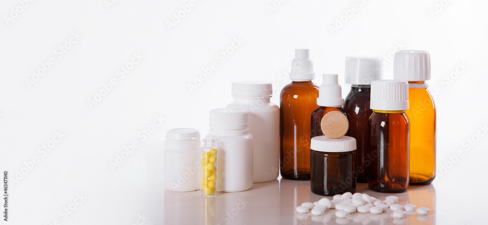 medicine capsules laid out on a folder medicine capsules laid out on a folder