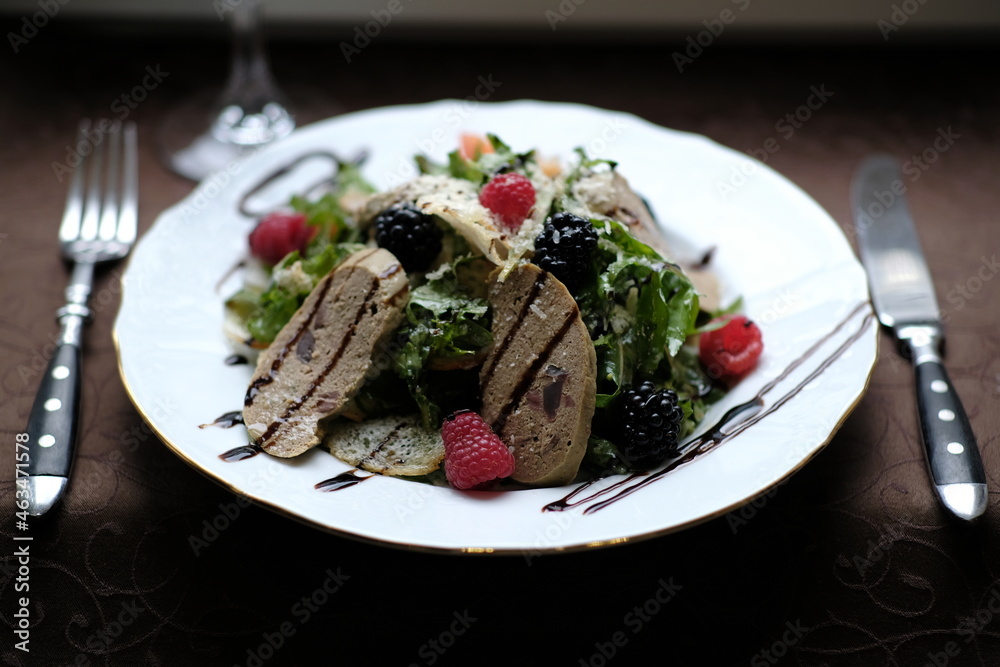 salad of herbs, berries and meat pate