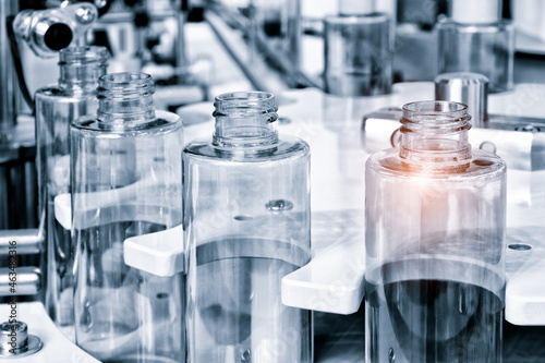 Obraz na plátně pharmaceutical industry, medicine pills are filling in the  bottle on production line machine conveyor at the medical factory