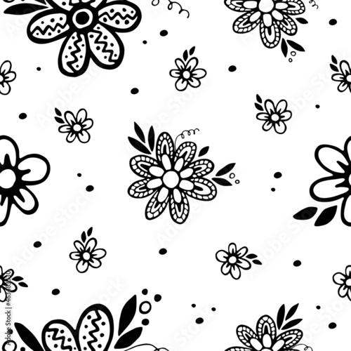 Vector seamless pattern. Good for textile or craft paper. Black ethnic flowers isolated on white background. 