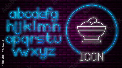 Glowing neon line Varenyky in a bowl icon isolated on brick wall background. Pierogi, varenyky, dumpling, pelmeni, ravioli. Traditional Ukrainian food. Neon light alphabet. Vector