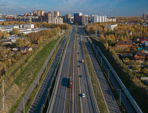 An expressway with a streetcar line in the middle of the road.. Kazan, Tatarstan, Russia. The Big Kazan Ring