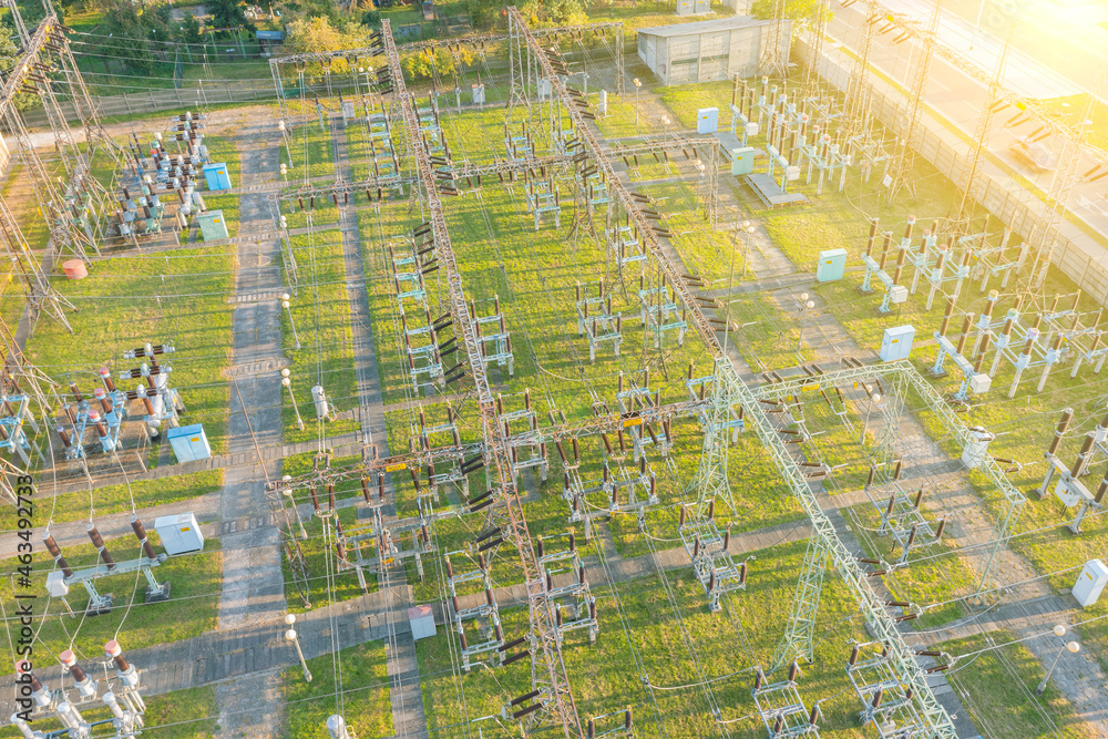 Top view of the city's electrical substation. A substation with transformers that distributes high voltage throughout the city. Top view of the city's electrical substation. A substation with transformers that distributes high voltage throughout the city.