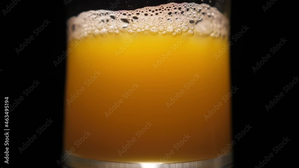 pouring orange juice into glass slow motion pouring orange juice into glass slow motion