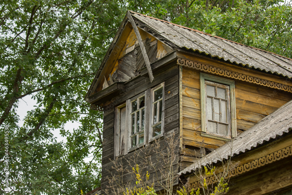 Old ruined wooden house in the village