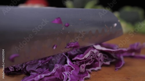 Wallpaper Mural chef cutting red cabbage with knife slow motion Torontodigital.ca