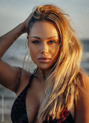 Summer outdoor style beach sea vacation portrait of beautiful girl in bikini. Summer vacation. Denmark.