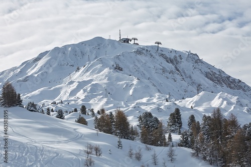 Skiing slopes, majestic Alpine landscape with snow and mountain range