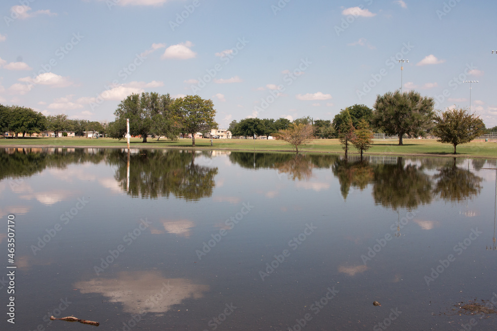 The Polluted Lake that forms in Album Park aka Eastwood Park, after it Rains in East El Paso,Texas The Polluted Lake that forms in Album Park aka Eastwood Park, after it Rains in East El Paso,Texas
