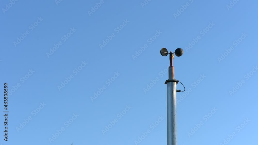 Tokyo,Japan - October 18, 2021: An anemometer on blue sky background
Tokyo,Japan - October 18, 2021: An anemometer on blue sky background