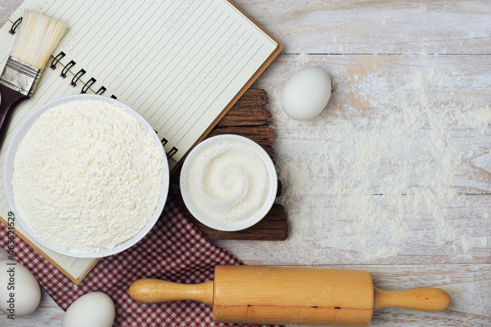 Homemade flour mixture on a wooden table, viewed from above.