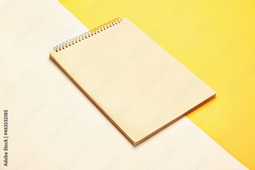 Blank open notebook on color background Blank open notebook on color background