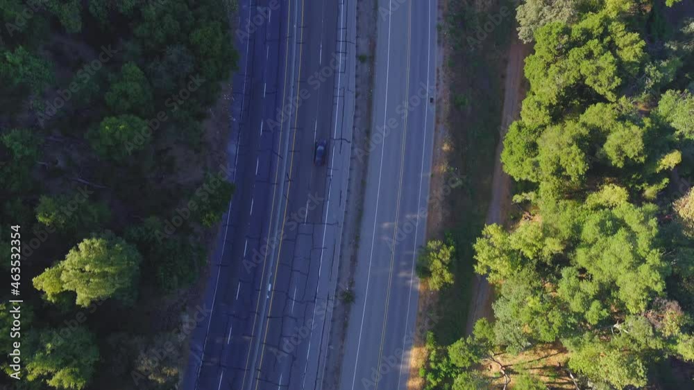 Aerial View Of Cars Driving At Santa Cruz Highway Near Lexington Reservoir In Los Gatos, California. Aerial View Of Cars Driving At Santa Cruz Highway Near Lexington Reservoir In Los Gatos, California.